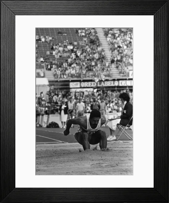Framed Print : Daley Thompson competing in the long jump during the Commonwealth Games Framed Print : Daley Thompson competing in the long jump during the Commonwealth Games