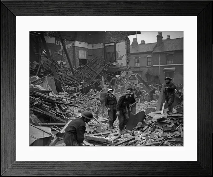 Framed Print : ARP and Rescue wardens sift through the rubble of the Belgravia Hotel, Balsall Heath