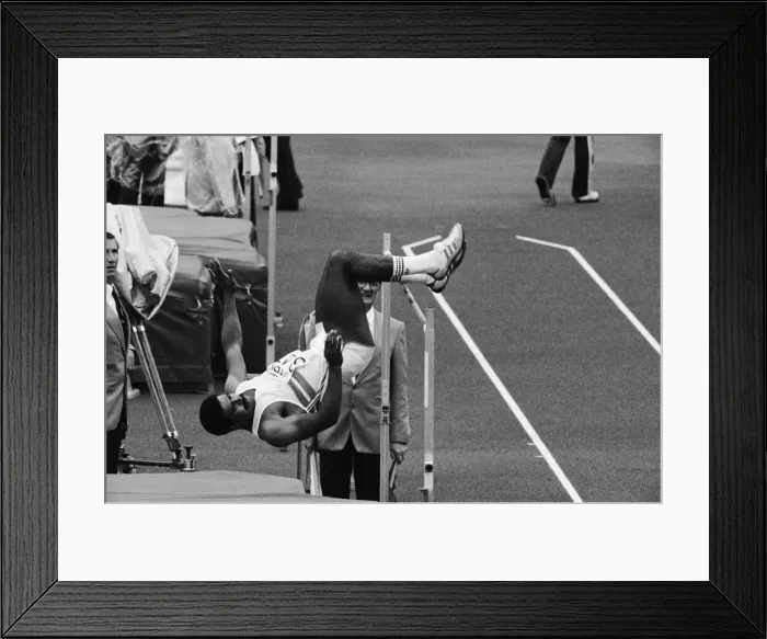 Framed Print : Daley Thompson leaps over the high jump on his way to winning the Decathlon Gold medal in Framed Print : Daley Thompson leaps over the high jump on his way to winning the Decathlon Gold medal in