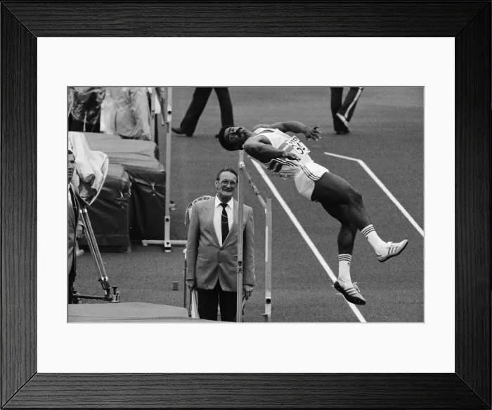 Framed Print : Daley Thompson leaps over the high jump on his way to winning the Decathlon Gold medal in Framed Print : Daley Thompson leaps over the high jump on his way to winning the Decathlon Gold medal in