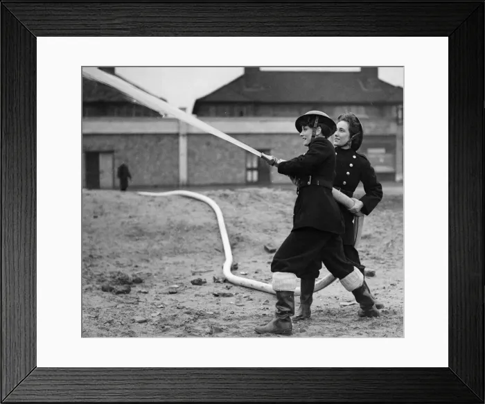 Framed Print : Fire women of the National Fire Service using a hose during training exercises inn Framed Print : Fire women of the National Fire Service using a hose during training exercises inn