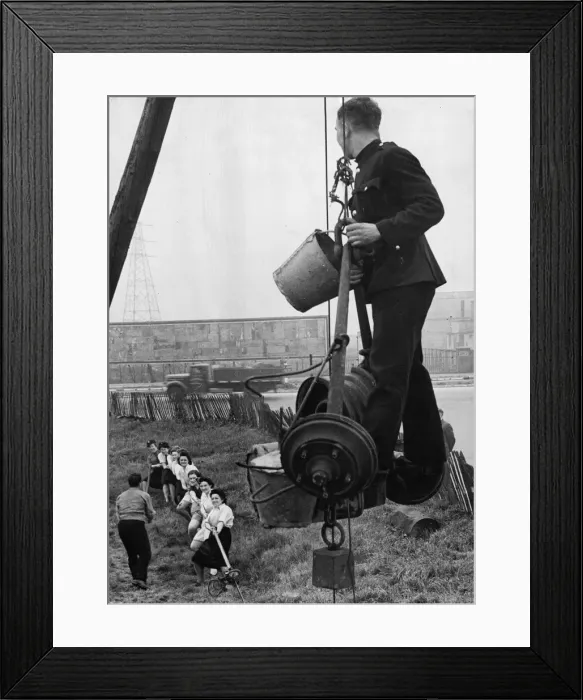 Framed Print : Because Ilford fire-women who are competing in a tug-o Framed Print : Because Ilford fire-women who are competing in a tug-o