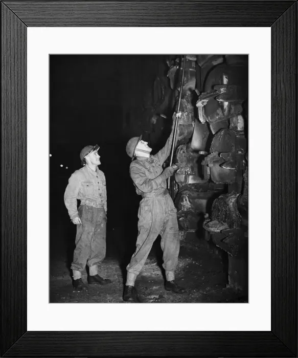 Framed Print : Soldiers at work in a gas works due to a lack of skilled labour during Second World War Framed Print : Soldiers at work in a gas works due to a lack of skilled labour during Second World War