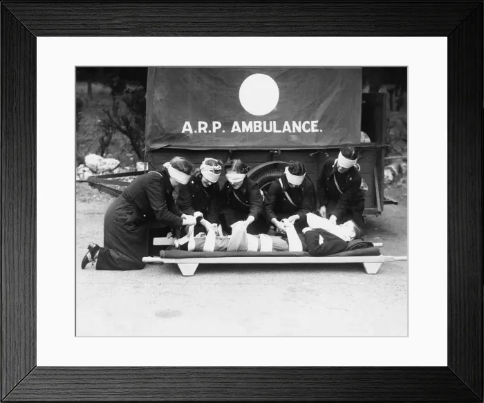 Framed Print : Morris Ambulance Department trainees attend to a casualty during a training exercise Framed Print : Morris Ambulance Department trainees attend to a casualty during a training exercise