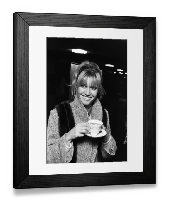 Framed Print : Singer and actress Olivia Newton John at Luton Airport. 28th November 1978