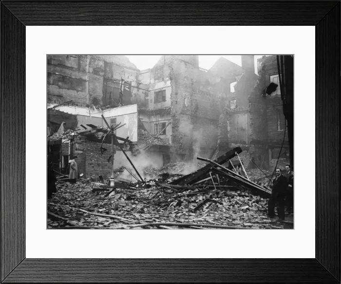 Framed Print : Damage to shops and houses in a West Midlands town following an air raid during Framed Print : Damage to shops and houses in a West Midlands town following an air raid during