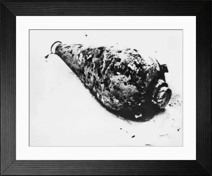 Framed Print : A German explosive conical float washed ashore during Second World War