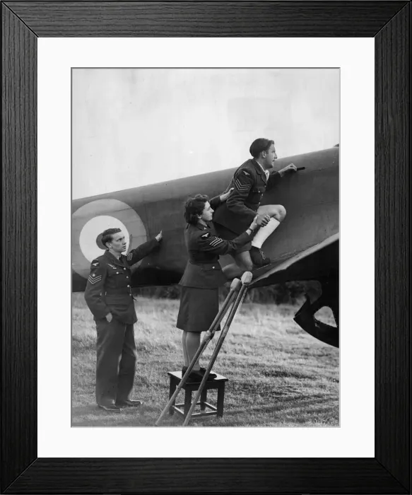 Framed Print : Sergeant Betty Dunn, a WaF masseuse, helps Sergeant Wheeler of Tottenham to try out his Framed Print : Sergeant Betty Dunn, a WaF masseuse, helps Sergeant Wheeler of Tottenham to try out his