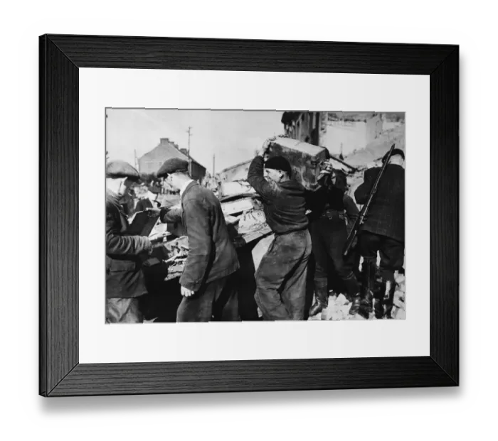 Framed Print : Free French Infantry carry off arms and ammunition from a knocked out German truck