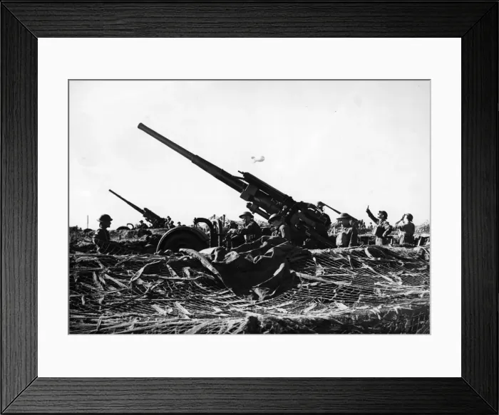 Framed Print : A heavy anti-aircraft battery in action on the South East Coast during an air attack