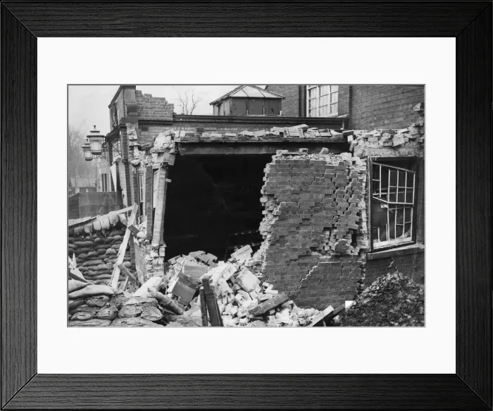 Framed Print : Several people were slightly injured when a bomb struck the corner of Kings Heath public