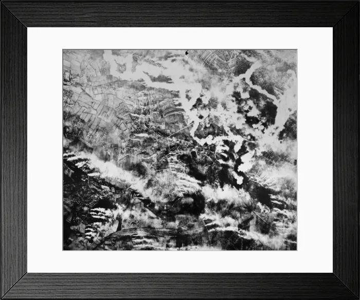 Framed Print : Pouring into swirling, billowing clouds of smoke rising from bomb battered Kiel