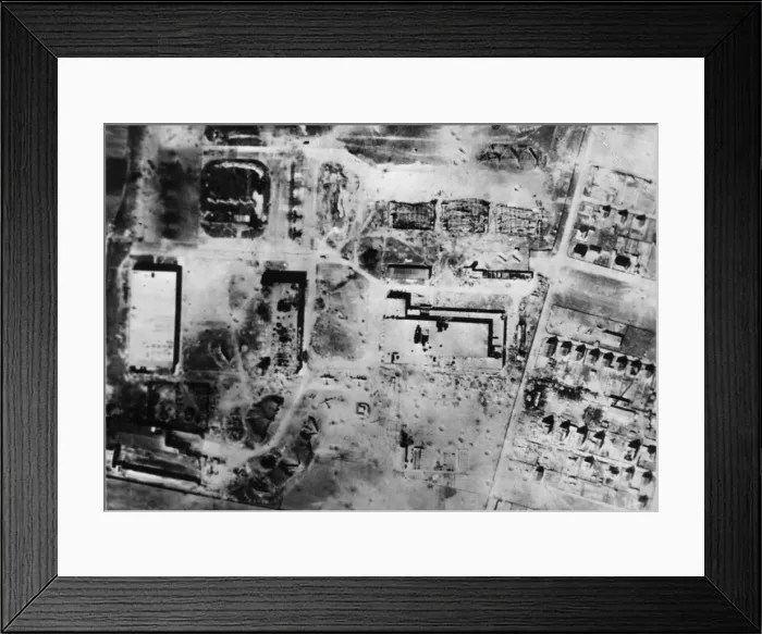 Framed Print : Severe damage to important buildings is shown in this reconnaissance picture after Framed Print : Severe damage to important buildings is shown in this reconnaissance picture after
