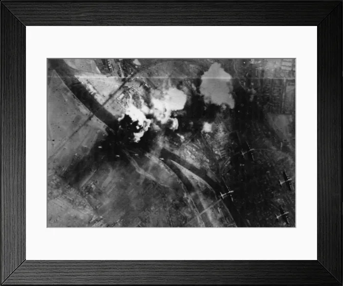 Framed Print : Strings of bombs head for the already burning target at Regensburg