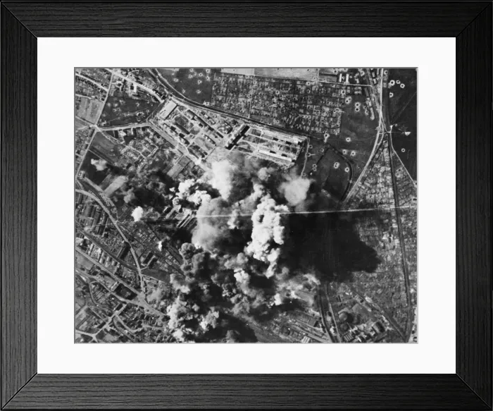 Framed Print : Murky smoke spouts up from the Bettenhausen Focke Wulf plant at Kassel as bombs register Framed Print : Murky smoke spouts up from the Bettenhausen Focke Wulf plant at Kassel as bombs register