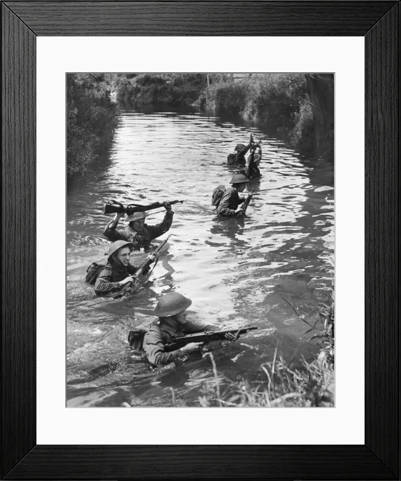 Framed Print : Army Training. Young NCOs (Non-commissioned officers) crossing a river Framed Print : Army Training. Young NCOs (Non-commissioned officers) crossing a river