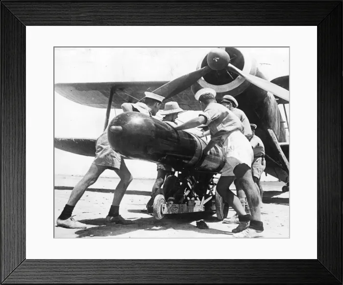 Framed Print : Torpedo being loaded on to an aeroplane of the Fleet Air Arm in the Mediterranean Framed Print : Torpedo being loaded on to an aeroplane of the Fleet Air Arm in the Mediterranean