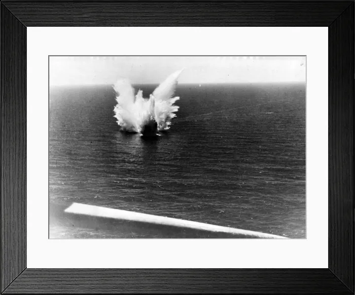 Framed Print : A stick of bombs from a Sunderland aircraft exploding near an Italian submarine in Framed Print : A stick of bombs from a Sunderland aircraft exploding near an Italian submarine in