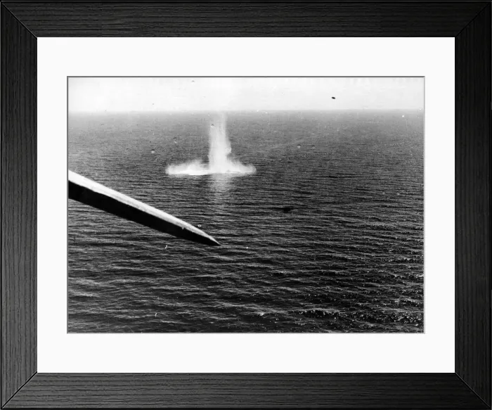 Framed Print : As the upheaval from a stick of bombs dropped by a Sunderland aircraft subsides an Framed Print : As the upheaval from a stick of bombs dropped by a Sunderland aircraft subsides an