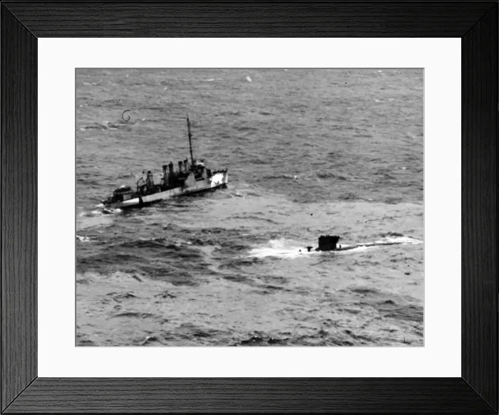 Framed Print : British destroyer standing by to take possession of U-boat captured by RAF Framed Print : British destroyer standing by to take possession of U-boat captured by RAF