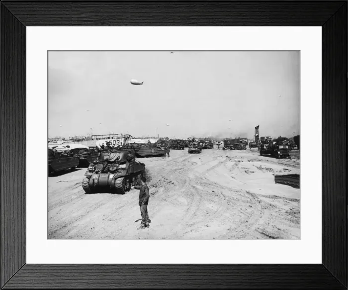 Framed Print : Tanks and equipment being unloaded on the beaches of Normandy. 9th June 1944 Framed Print : Tanks and equipment being unloaded on the beaches of Normandy. 9th June 1944
