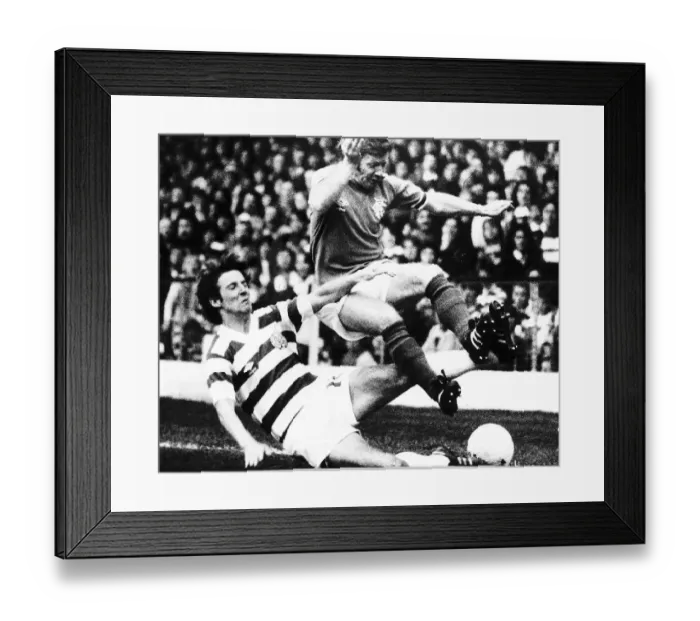 Framed Print : Tommy Burns Celtic football player slide tackles Rangers Alex MacDonald