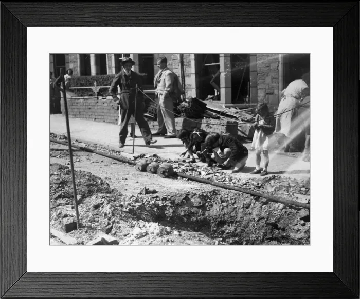 Framed Print : Children search for bomb shrapnel in the gutters of Edward Street, Redfield Framed Print : Children search for bomb shrapnel in the gutters of Edward Street, Redfield