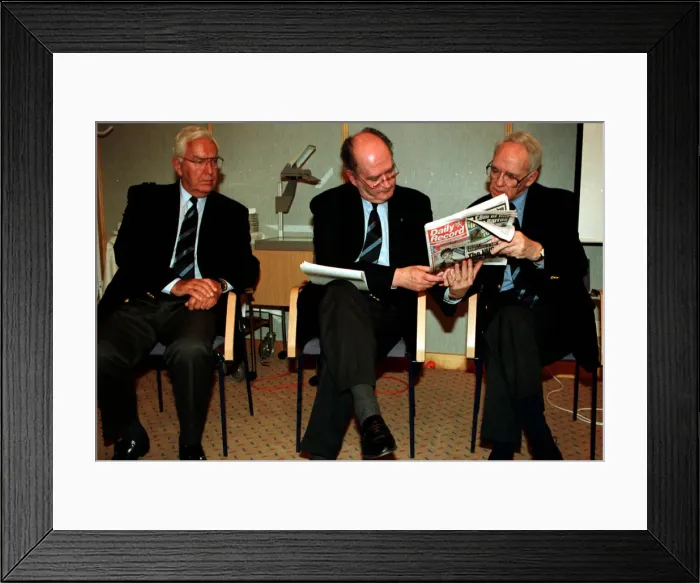 Framed Print : Jack McGinn Celtic football director sitting in chair showing Dazily Record to Bill Framed Print : Jack McGinn Celtic football director sitting in chair showing Dazily Record to Bill