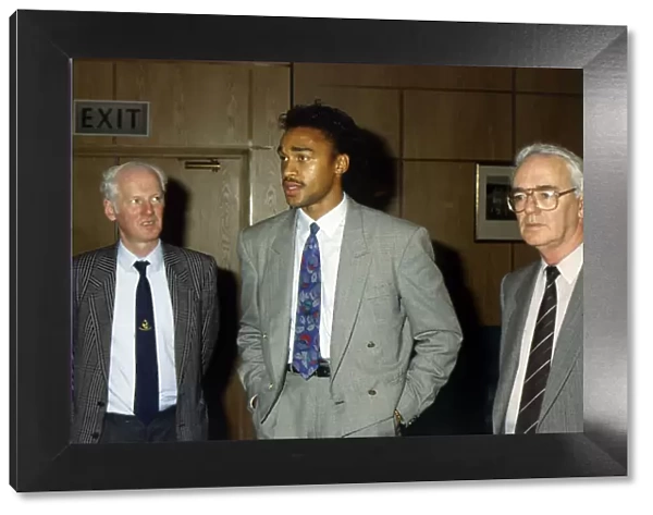 Paul Elliott with Celtic football directors July 1989