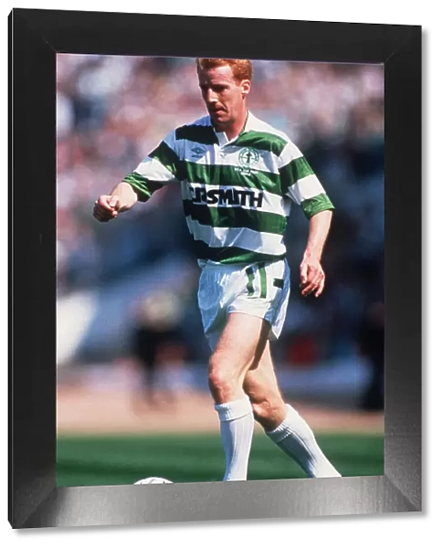 Tommy Burns running with ball January 1990