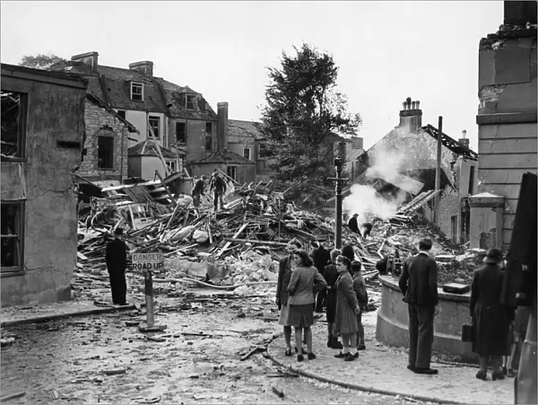Scene showing a destroyed residential street in the city of Plymouth following an air