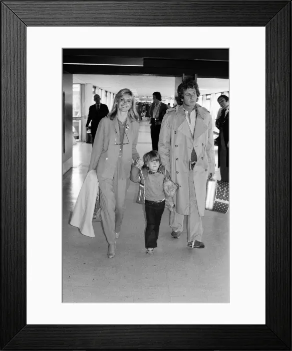 Framed Print : Olivia Newton John departing Heathrow Airport with her nephew Emerson Framed Print : Olivia Newton John departing Heathrow Airport with her nephew Emerson