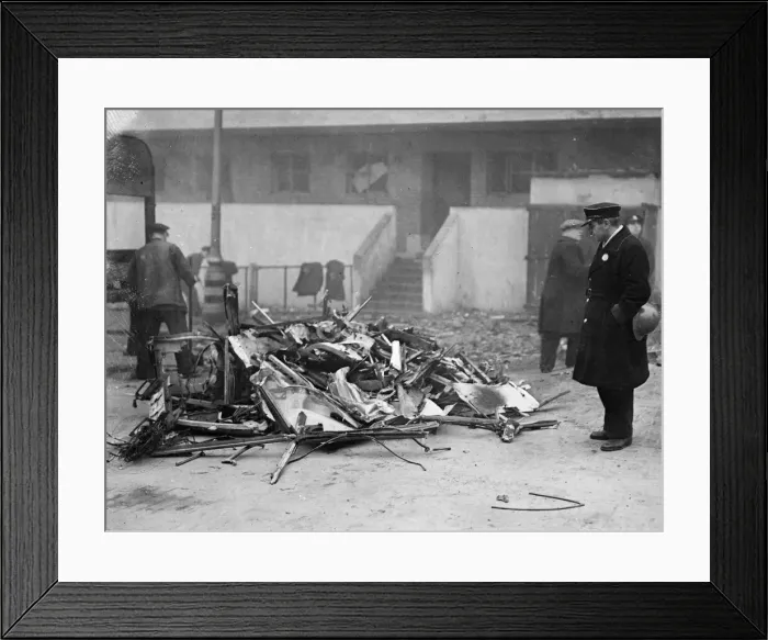 Framed Print : The remains of a bus, destroyed in Stepney, East London following an air raid by Framed Print : The remains of a bus, destroyed in Stepney, East London following an air raid by
