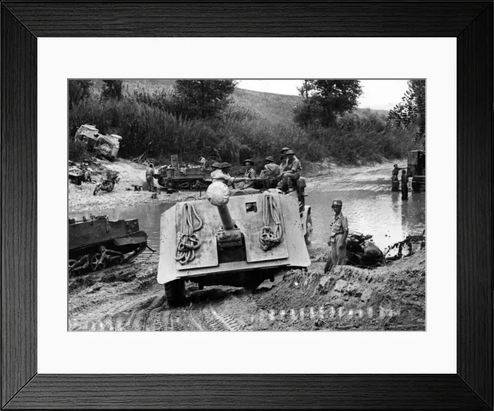 Framed Print : A 17-pdr anti-tank gun of 269 Battery, 87th Anti-Tank Regiment is towed across the River Framed Print : A 17-pdr anti-tank gun of 269 Battery, 87th Anti-Tank Regiment is towed across the River