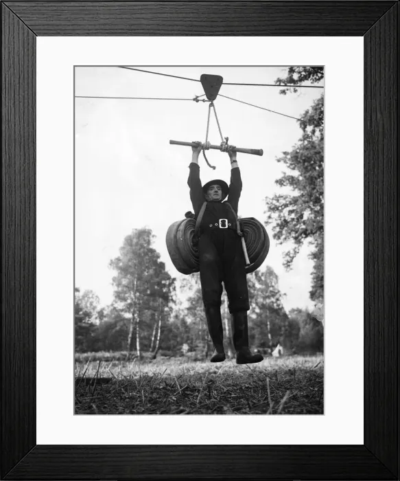 Framed Print : Fireman training commando style. World War Two. Picture taken 7th