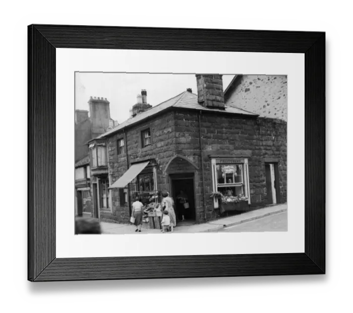 Framed Print : Corner Shop in Pwllheli, that used to be the jail for the town in Gwynedd
