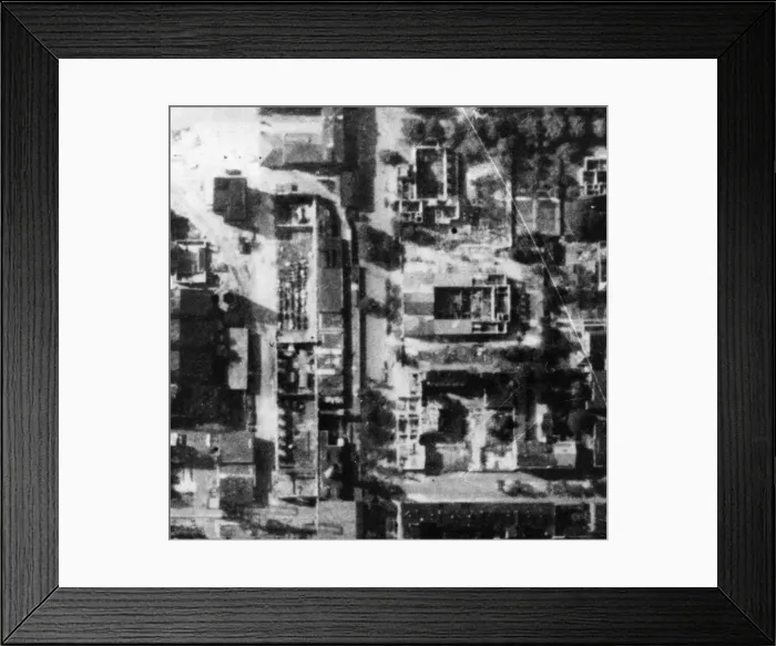 Framed Print : R. A. F. reconnaissance photos of bomb damage to submarine yards
