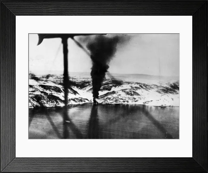 Framed Print : The German destroyer Hermann Kunne beached and burning in Herjangs Fjord following