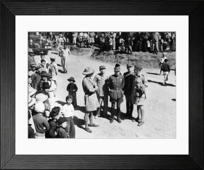 Framed Print : British and Chinese Officers meet on the road in Burma. Chinese reinforcements passing Framed Print : British and Chinese Officers meet on the road in Burma. Chinese reinforcements passing