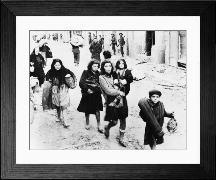Framed Print : People of Ortona return home. A town captured by by 8th Army Canadians after days