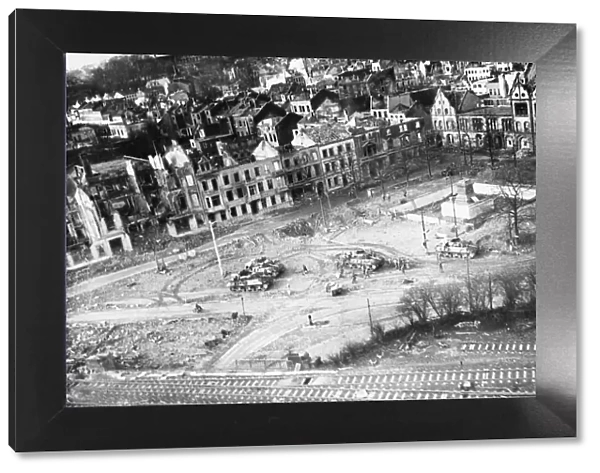Capture of Monchengladbach. American tanks in the Square of the bomb-torn town of Monchengladbach. Circa 1940s