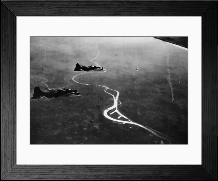 Framed Print : A Messerschmitt 110 goes down in flaming pieces before the massed fire power of Framed Print : A Messerschmitt 110 goes down in flaming pieces before the massed fire power of