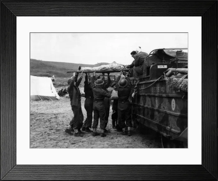Framed Print : British 8th Army amphibious vehicles Ducks'being loaded with casualties by Framed Print : British 8th Army amphibious vehicles Ducks'being loaded with casualties by