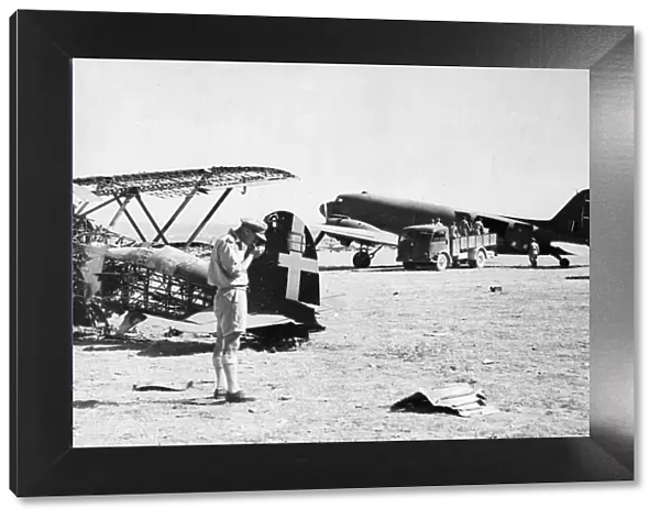 Dakota transport planes being unloaded on a captured airfield in southern Italy during