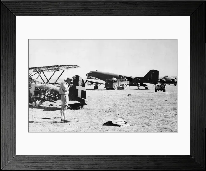 Framed Print : Dakota transport planes being unloaded on a captured airfield in southern Italy during