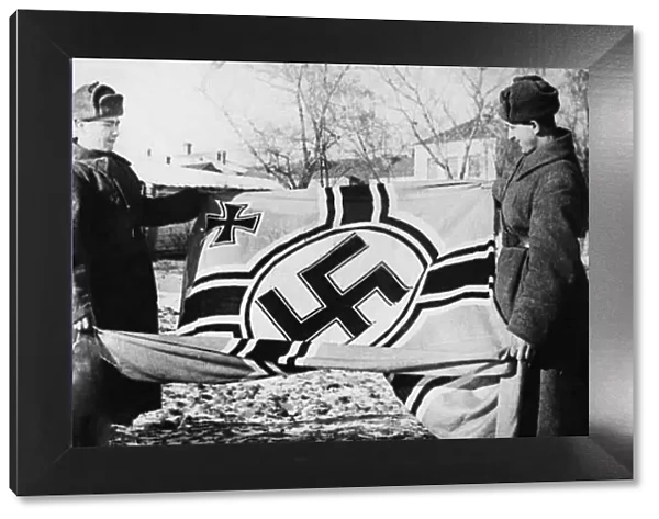 German flags captured by the 341st Reconnaissance Batallion of the 16th Motorised