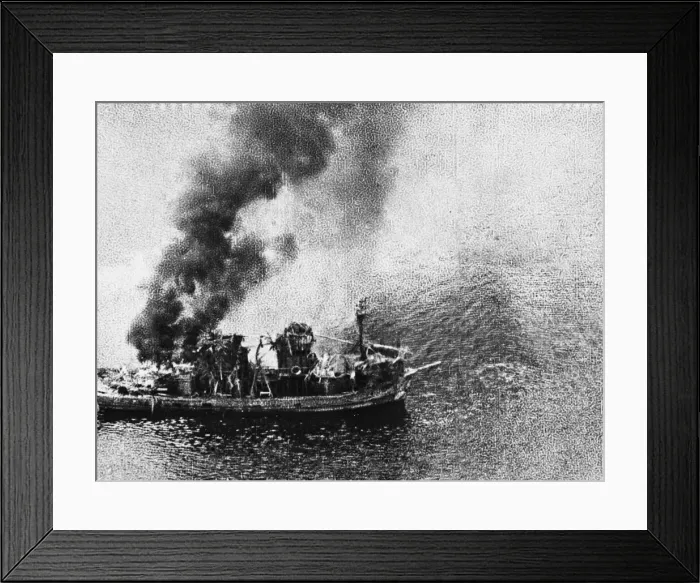 Framed Print : This burning tug is the result of of an attack by R. A. F. Liberators in the Gulf of Siam Framed Print : This burning tug is the result of of an attack by R. A. F. Liberators in the Gulf of Siam
