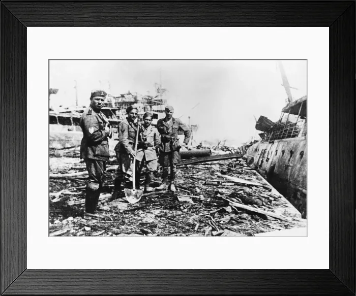 Framed Print : Axis troops clear up the debris on Spanish Mole, Tripoli, after an RAF raid Framed Print : Axis troops clear up the debris on Spanish Mole, Tripoli, after an RAF raid