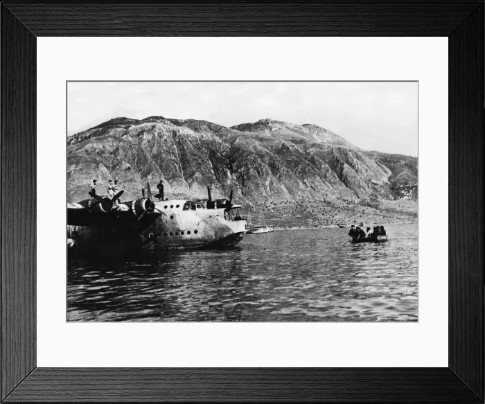 Framed Print : RAF personnel being rowed out to a waiting Sunderland Flying Boat Framed Print : RAF personnel being rowed out to a waiting Sunderland Flying Boat