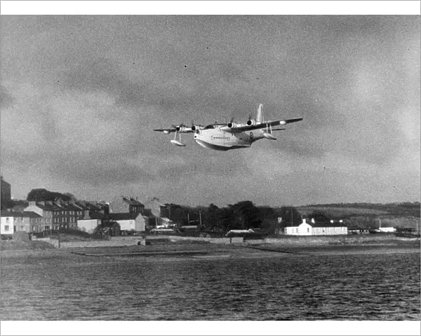 A Sunderland Flying Boat spreads its wings over the Pembrokeshire village of Neyland as